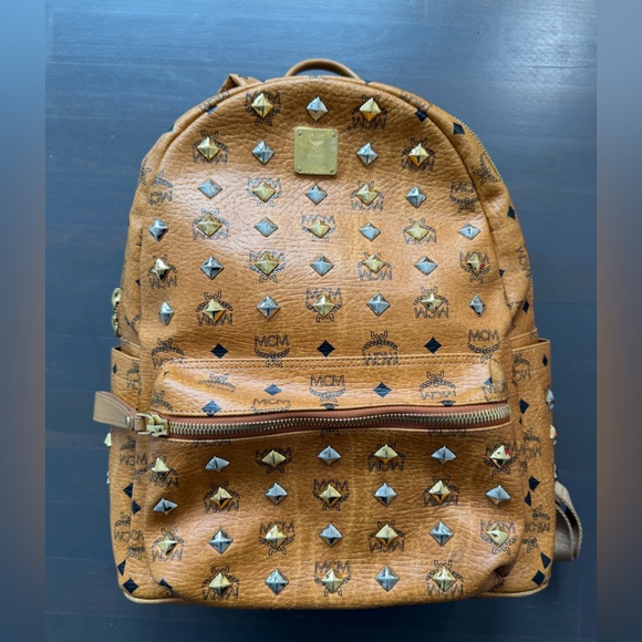 MCM Handbags - MCM Limited Edition Stark Side Studded Backpack Color Cognac Leather